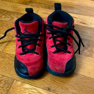 Size 7c red and black toddler Jordan’s.